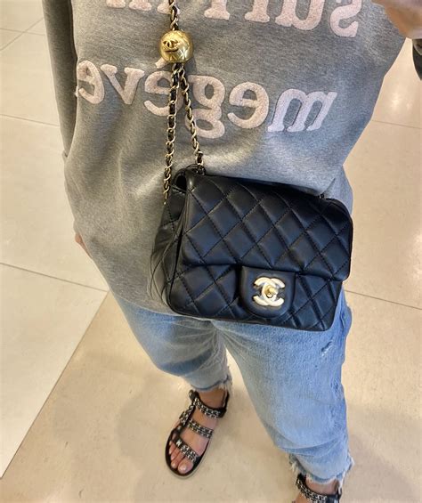 chanel flap bag with ball on chain